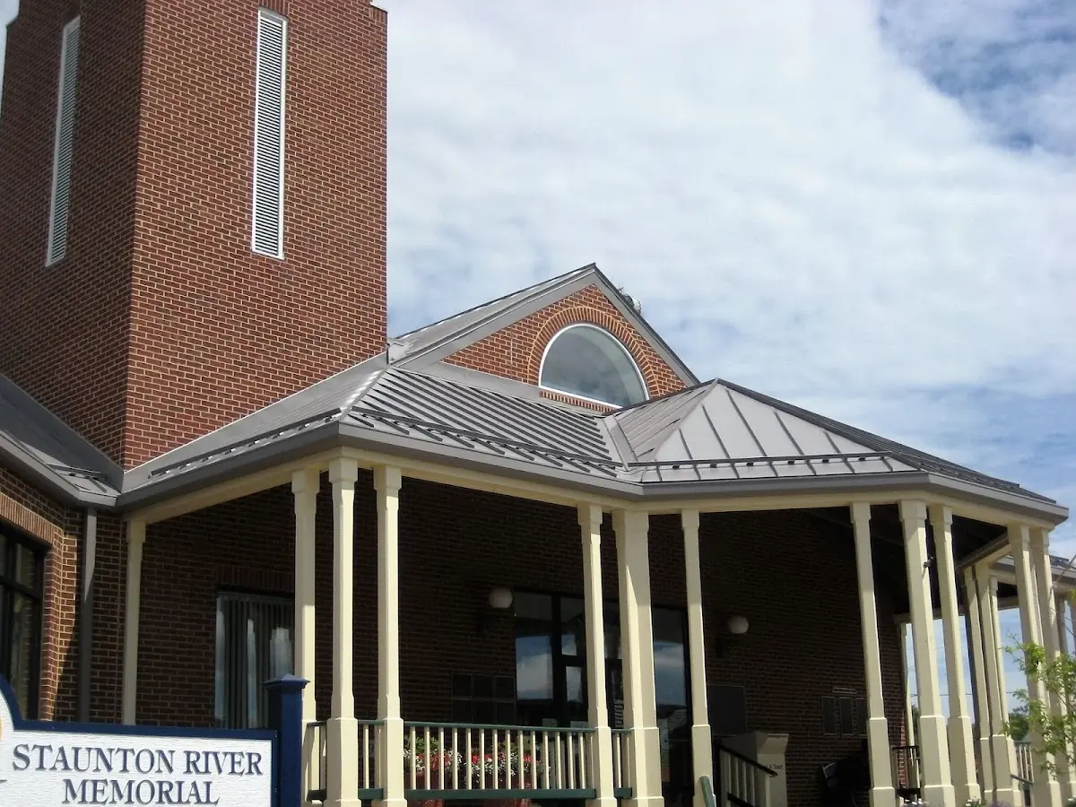 Skilled roofing craftsmen working on a residential roof in Pipersville